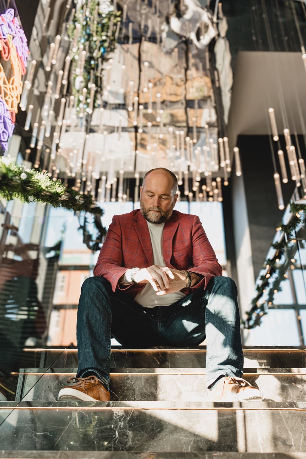 Robert Floyd seated in a hospitality setting